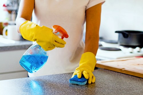 Technician preparing carpet cleaning equipment at a property
